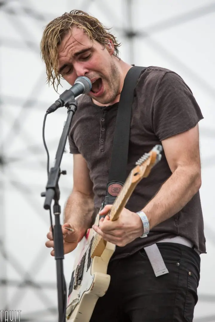 Concert Photographer Singer with a Guitar