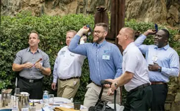 Guys playing games at team building event