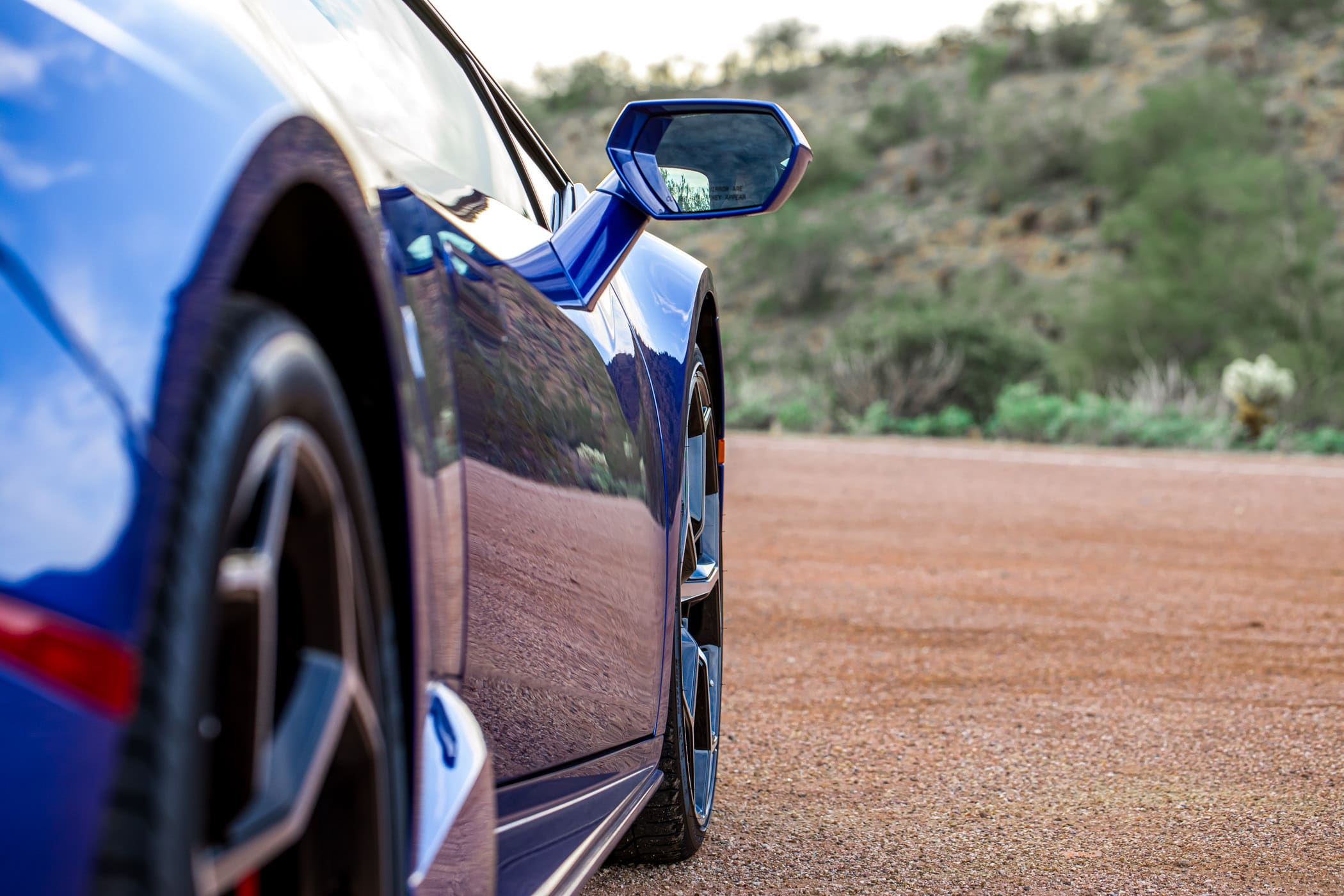 Lamborghini side panel and rear view mirror