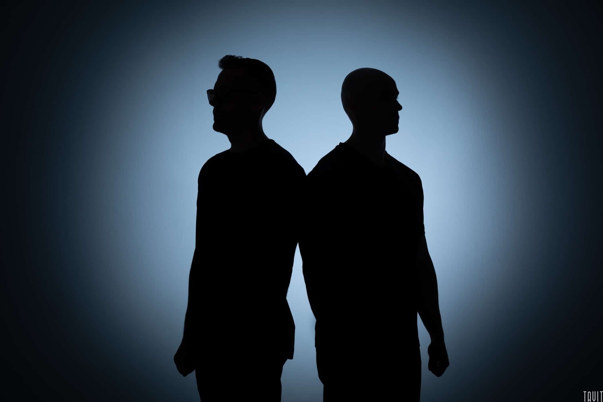 Two men silhouette headshot