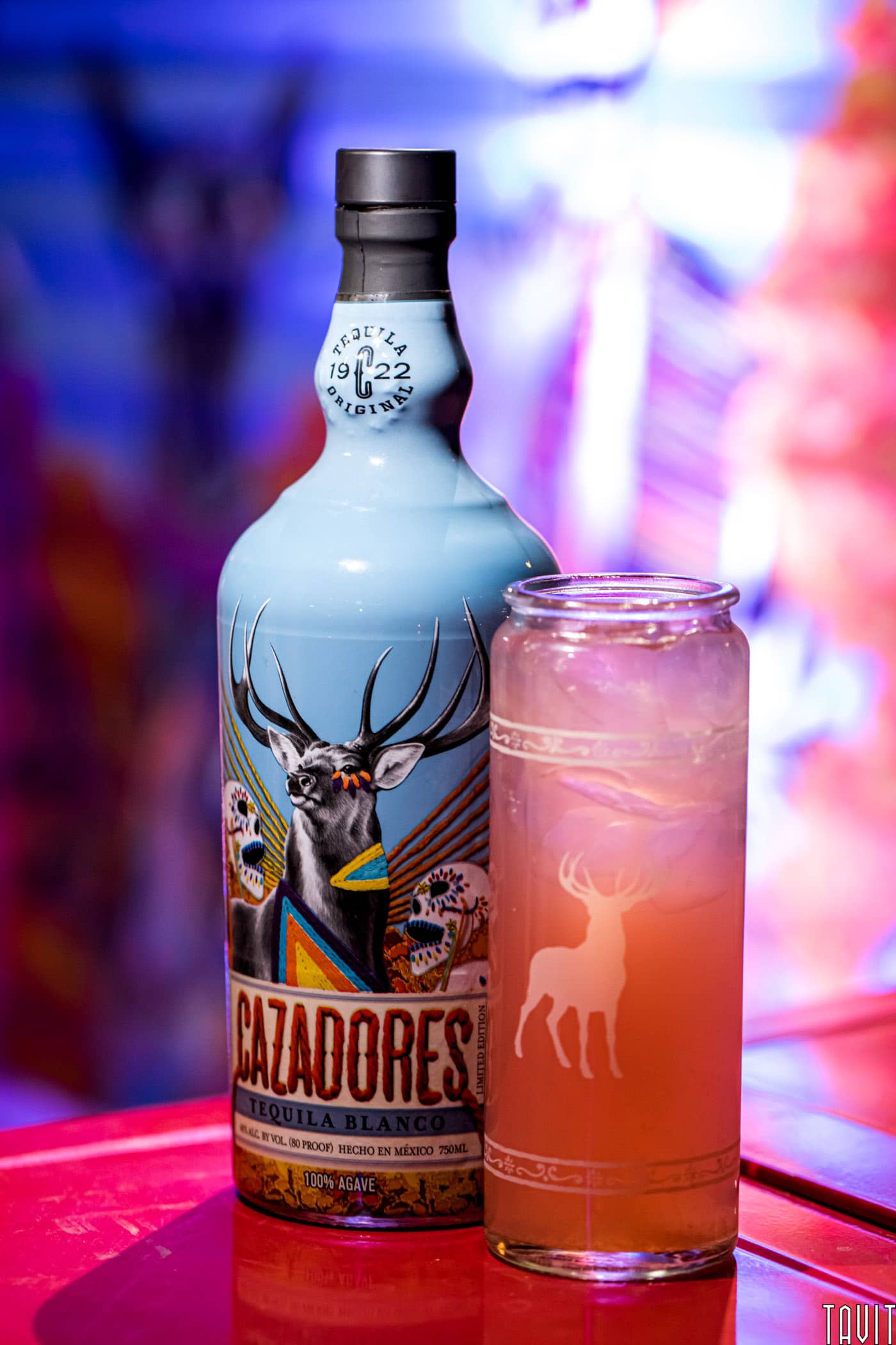 Cazadores tequila bottle with cocktail