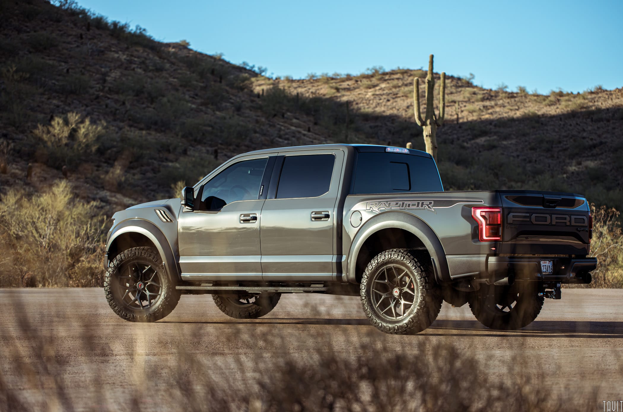 Side shot of Ford Raptor truck in desert