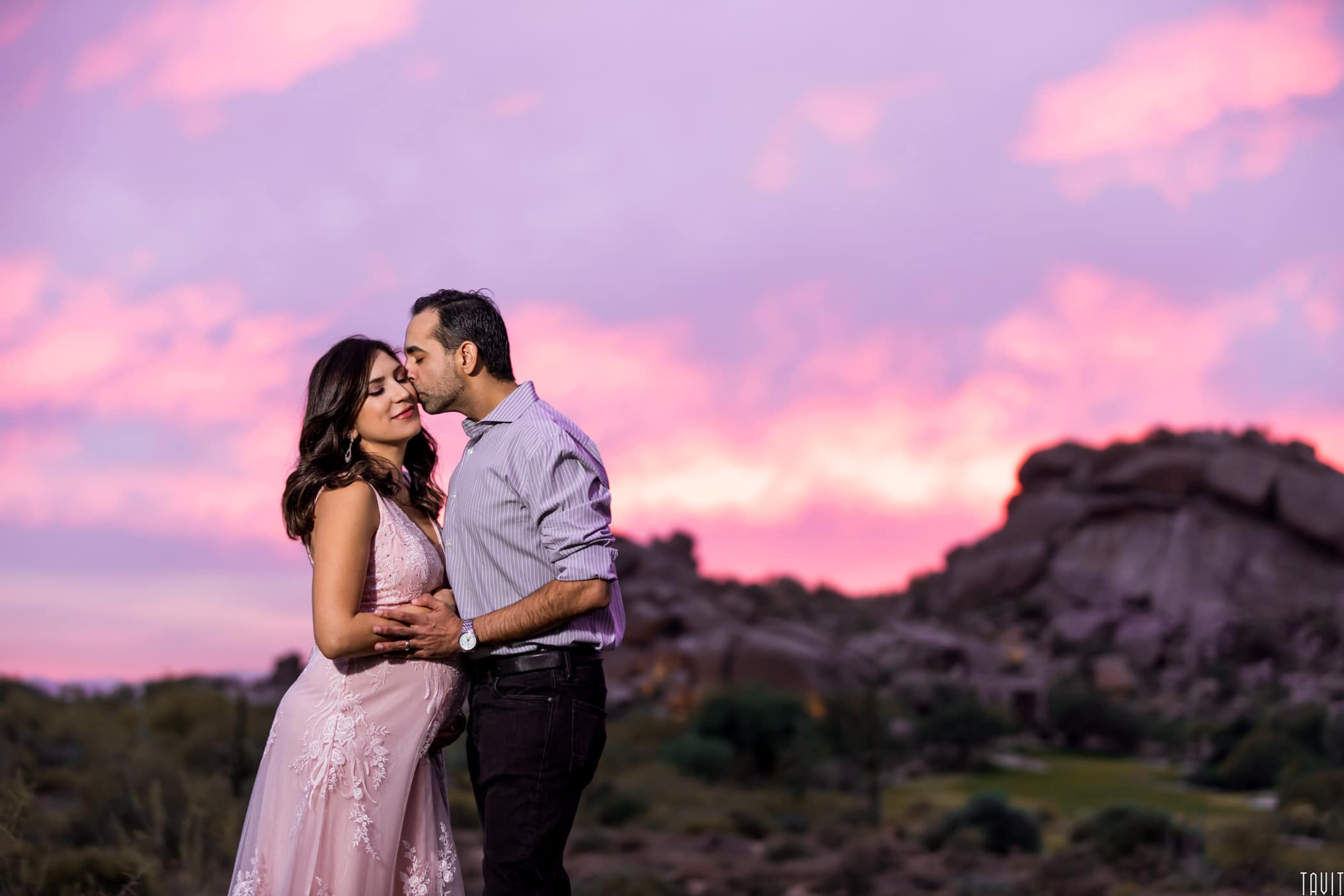Couple together at sunset maternity shoot