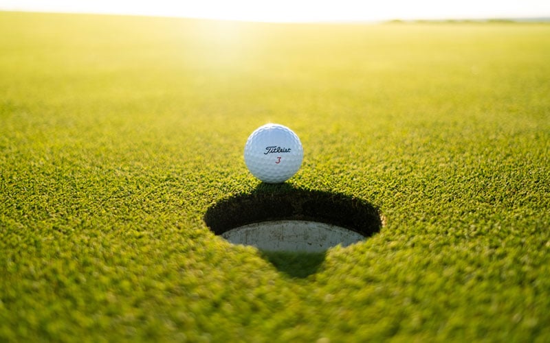 golf ball at hole