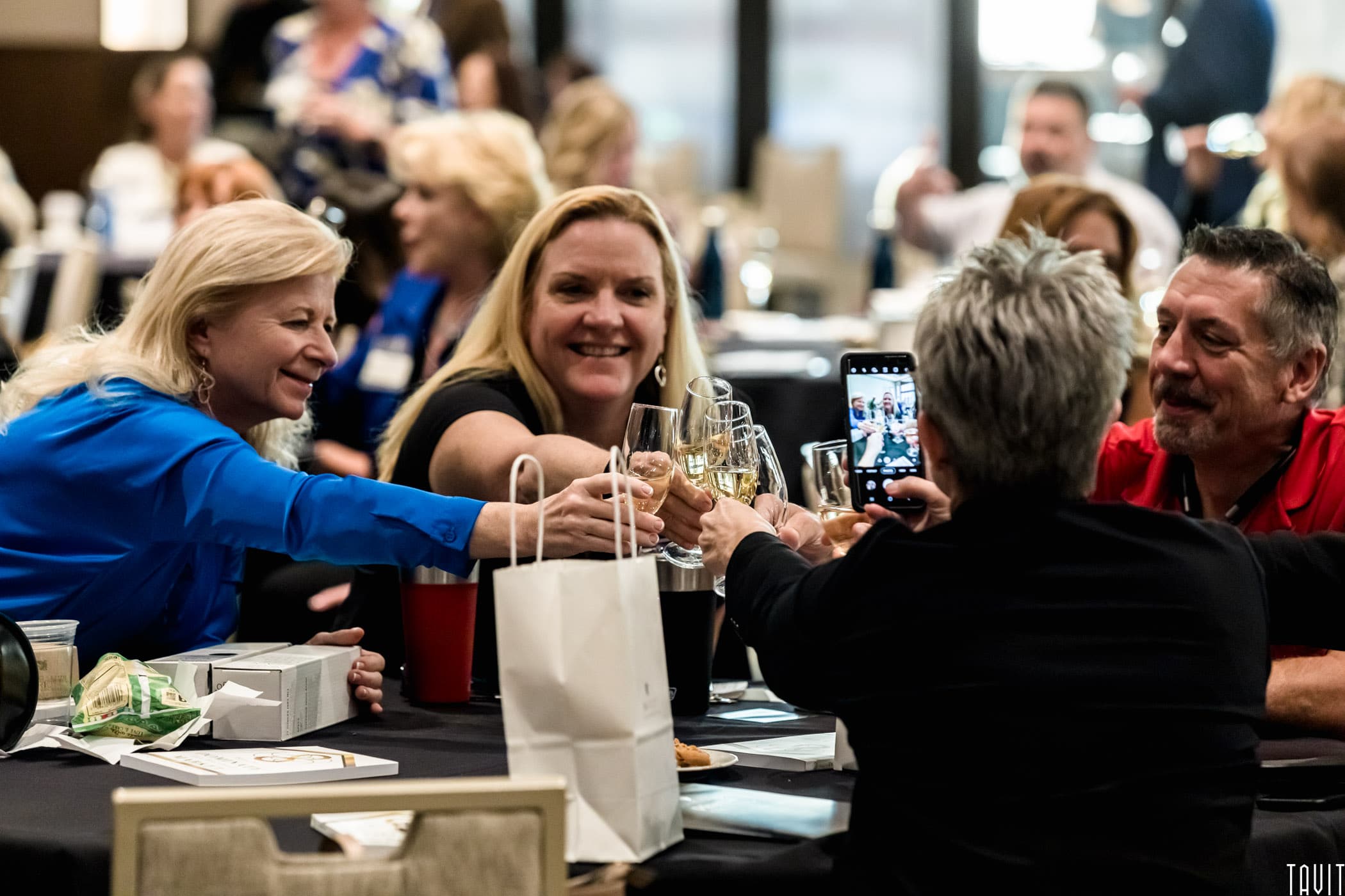 People toasting at business event