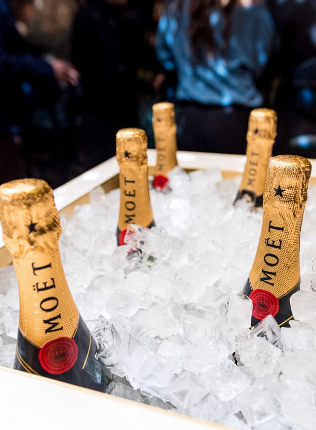 Bottles of Moet champagne on ice