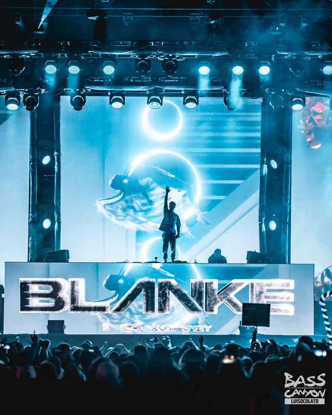 Blanke DJ on stage with arm raised
