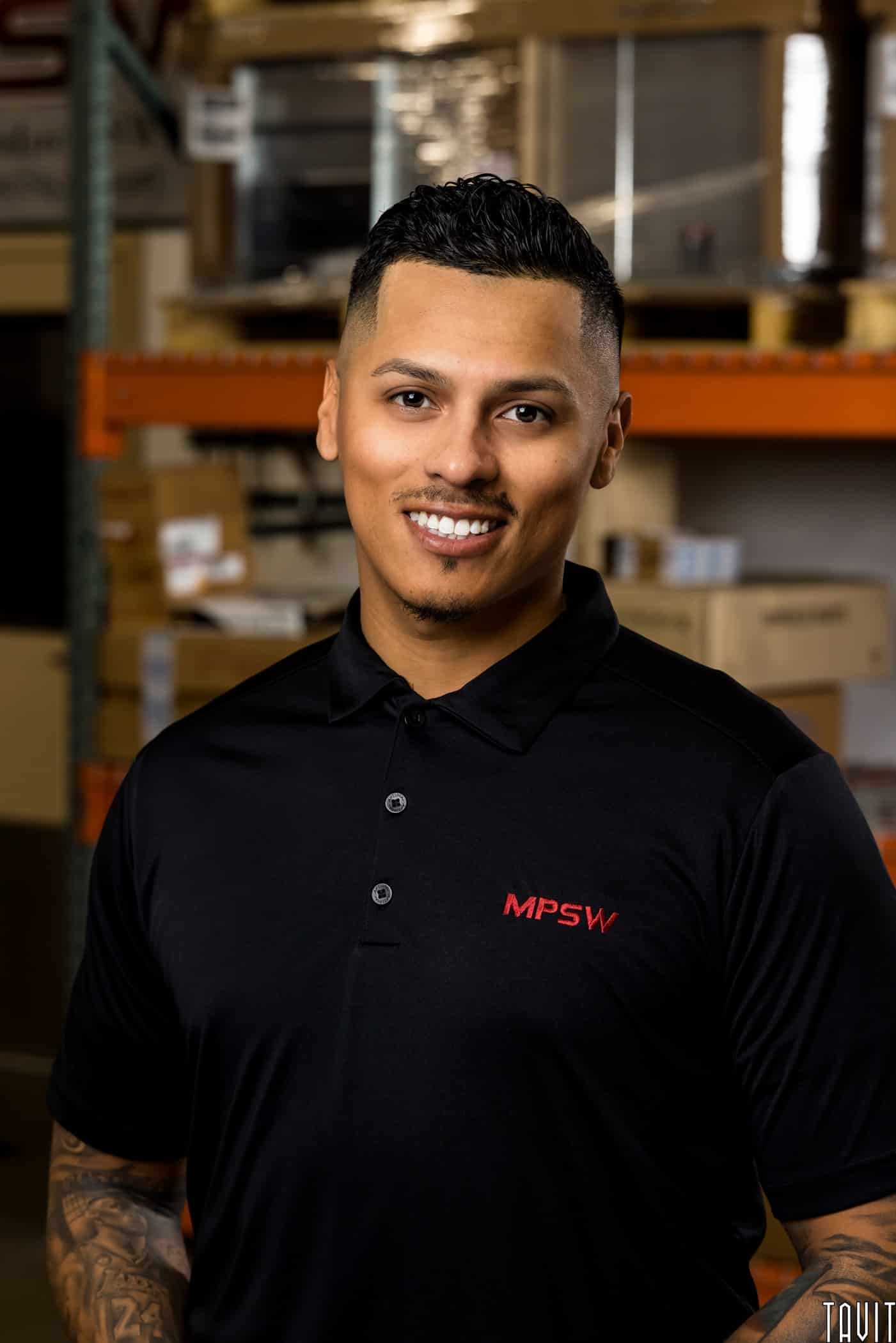 business headshot of man with MPSW shirt on