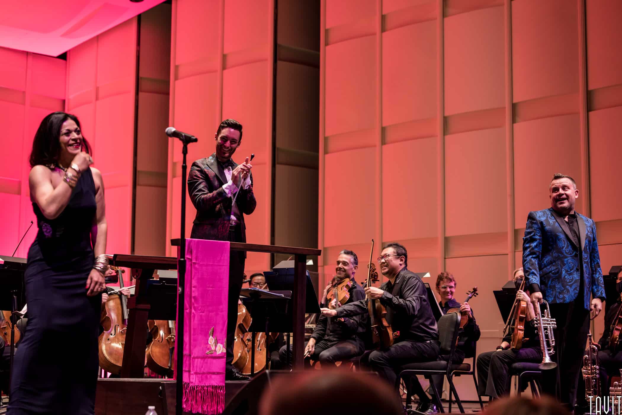 Conductor with the Phoenix Symphony and performers on stage