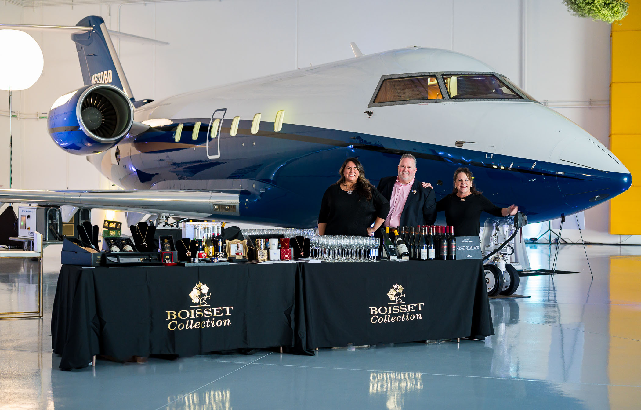 Boisset Collection display table in front of private jet