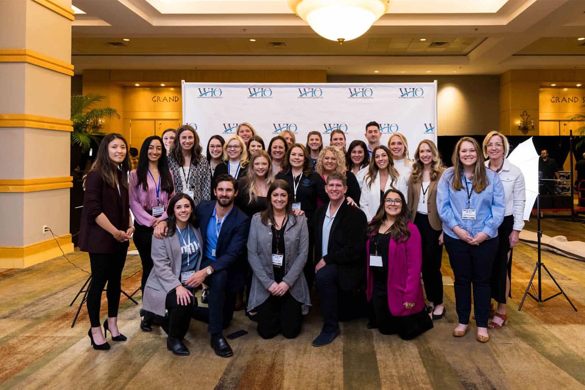 large group of attendees at the WIO corporate event