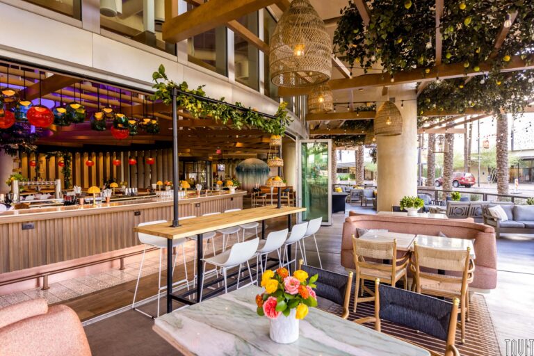 Outdoor patio seating near bar
