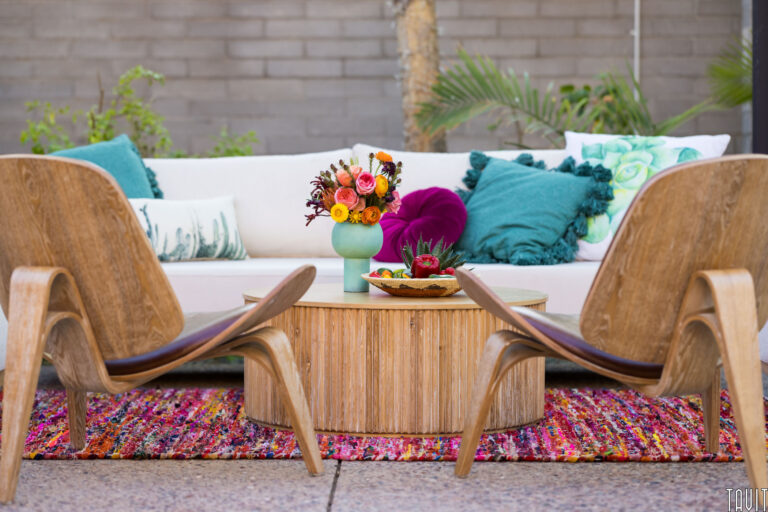 Lounge area on patio with couch and chairs