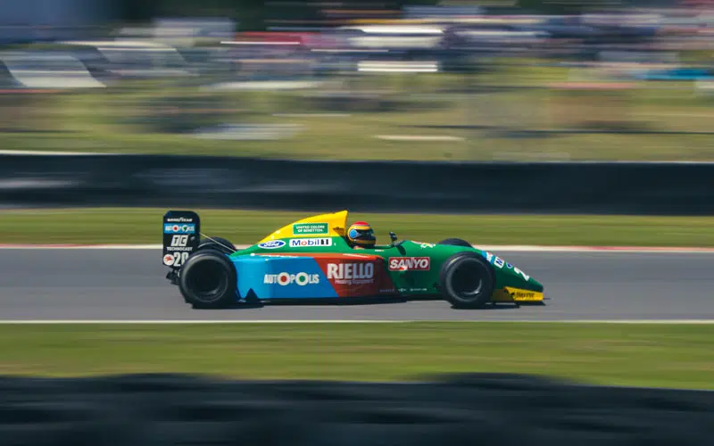 f1 car racing with blurry background