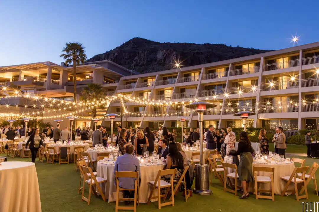 group of attendees at a corporate event outside venue at an AZ resort