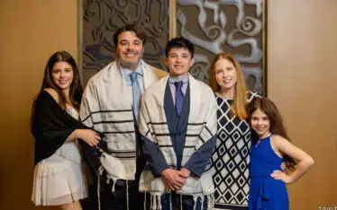 Jewish family photo at the young man's Bar Mitzvah