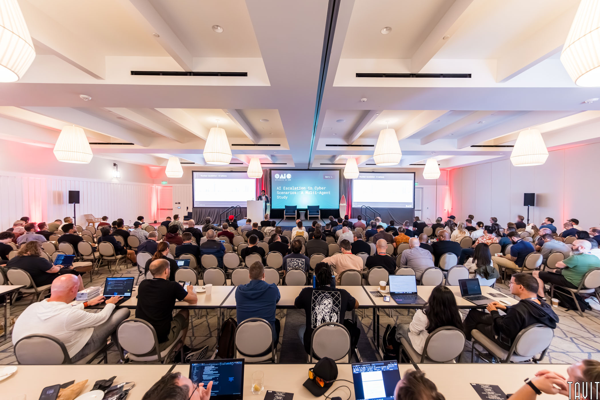 Attendees connect and talk during a corporate conference gathering