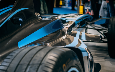 a close up of an F1 race car from the back rear of the car
