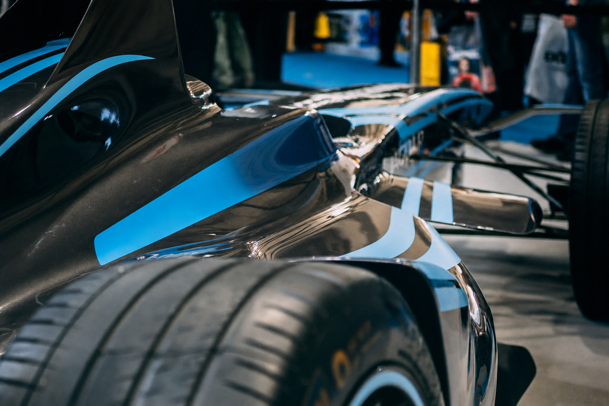 a close up of an F1 race car from the back rear of the car
